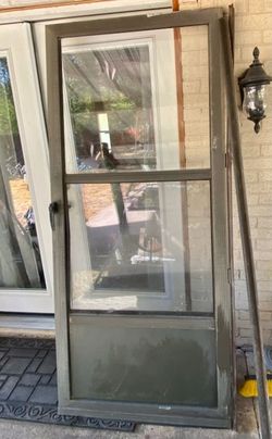 EXTERIOR DOOR METAL AND GLASS HAVE SCREEN ..VERY GOOD CONDITION