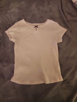 Cream shirt with Black Bow