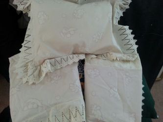 2 pillow cases with matching decorative pillow