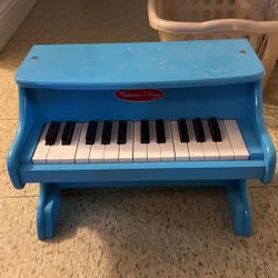 Piano de niños es buen estado 