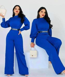 New Women's Jumpsuit And Belt Available In Size Small And Medium