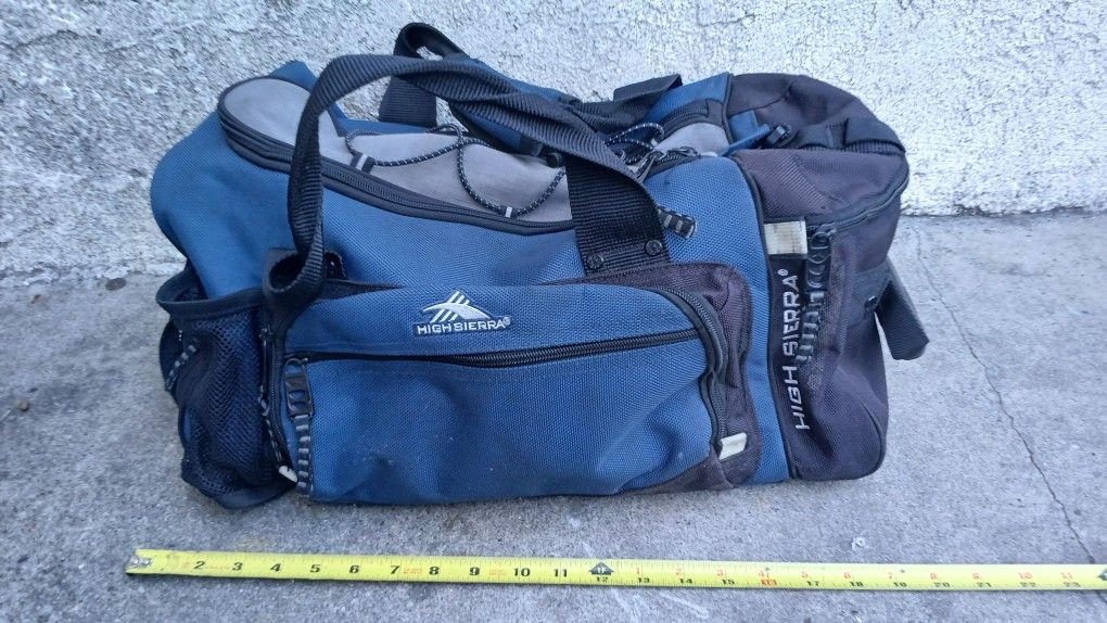 This is a blue and black High Sierra duffel bag.