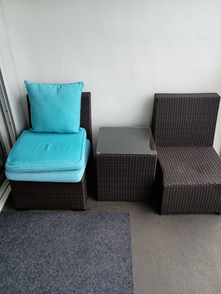 2 Chairs and Table.  Couch (Seats 2) and Glass table. Also Includes all cushions (blue) and Beige Extra Cushion covers