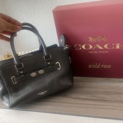 bolso Coach