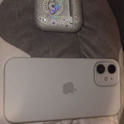 iPhone 12 Mini And AirPods 