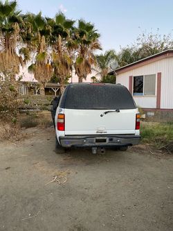 White Chevy Tahoe/Suburban SUV