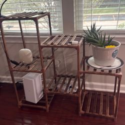 Plant stand with grow light