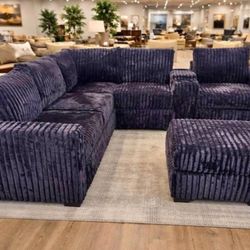 Black Jumbo corduroy sectional sofa wit ottoman and console