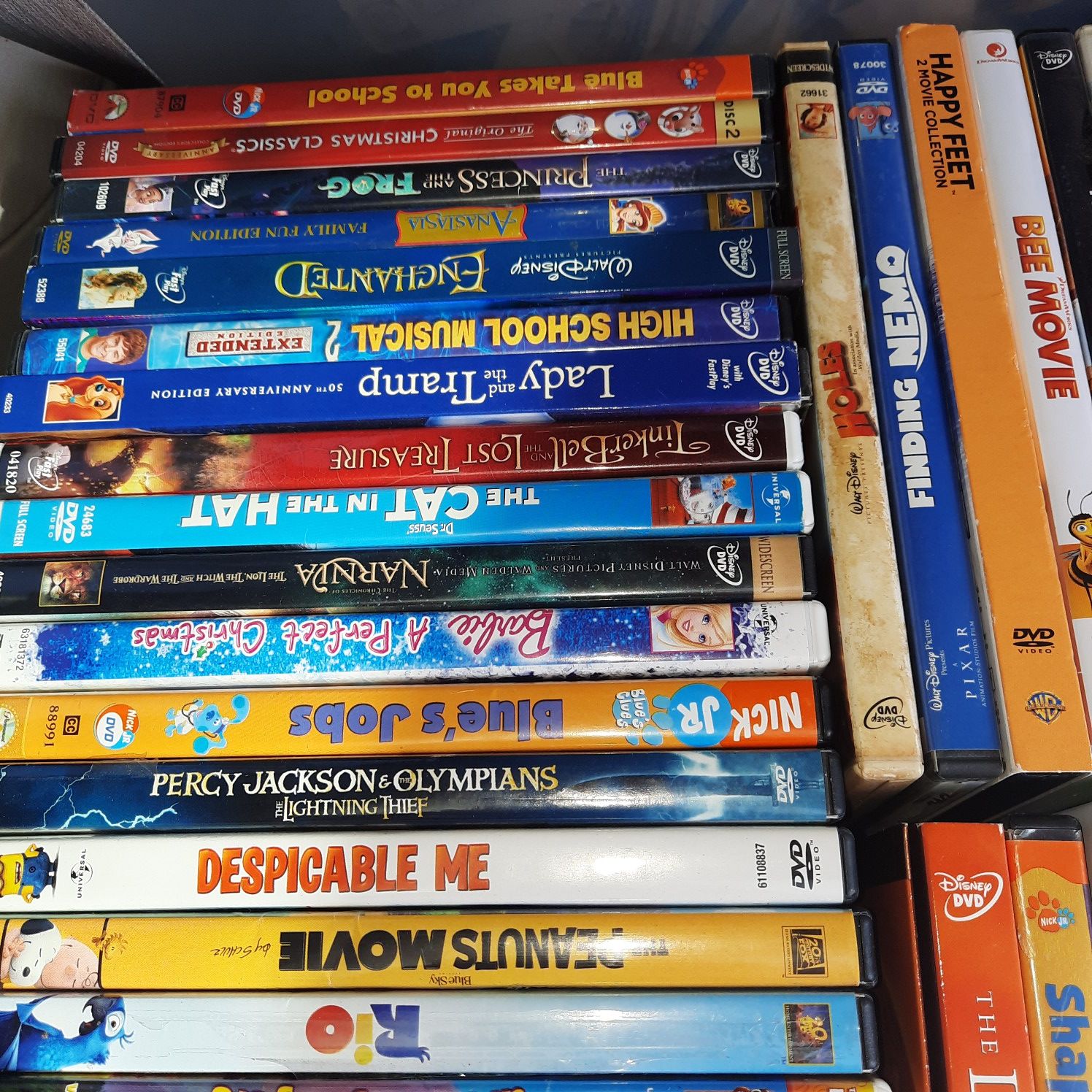 50 kids disney elf Rio and more animated family DVD movie wholesale lot