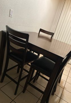 Dark brown Kitchen table one broken but Easy fix