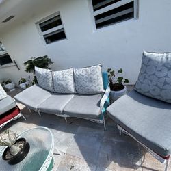 5 full sets of Reversible patio cushions.  5 back and 5 seats.