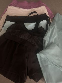 Lululemon athletic apparel short leggings a sports bras in various colors Size 0, 2 & 4