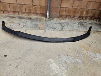 10-12. Ford Mustang v6 unanpainted black polyurethane lip