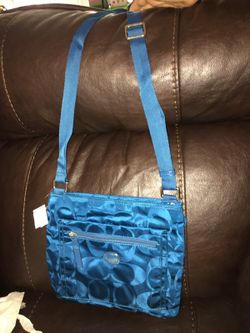 Blue Coach monogram cross body purse