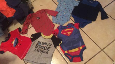 Shirt and onesies size 3,9 and 12 months $5