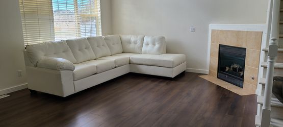 Ashley Furniture 2-Piece White Faux Leather Sectional Sofa with Chaise – Excellent Condition!