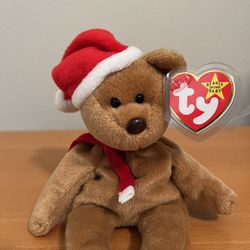  Ty Original Beanie Babies 1997. . New Condition.  He is wearing a red scarf with white fringe and a red hat with white