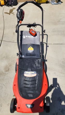 BLACK+DECKER cordless 24V lawn mower.