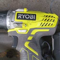 RYOBI DRILL WITH BITS AND CHARGER 