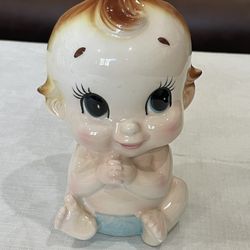 Vintage Japanese ceramic Kewpie-style baby head planter.