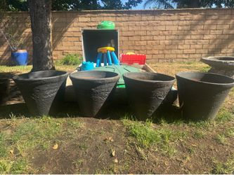 Sturdy large terracotta pots ( painted black) $10 each