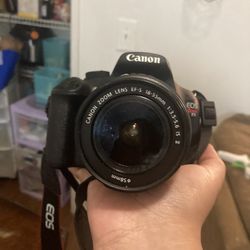 canon professional camera with extra lens