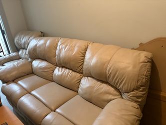 Cream Leather Reclining Sofa make an offer