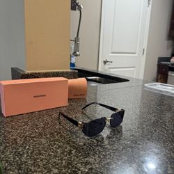 Miu miu Glasses