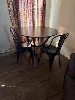 Wooden/black metal table