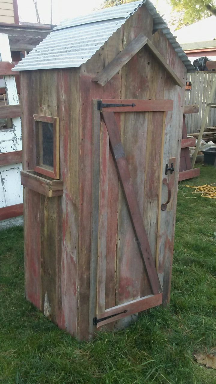 Barnwood outhouse