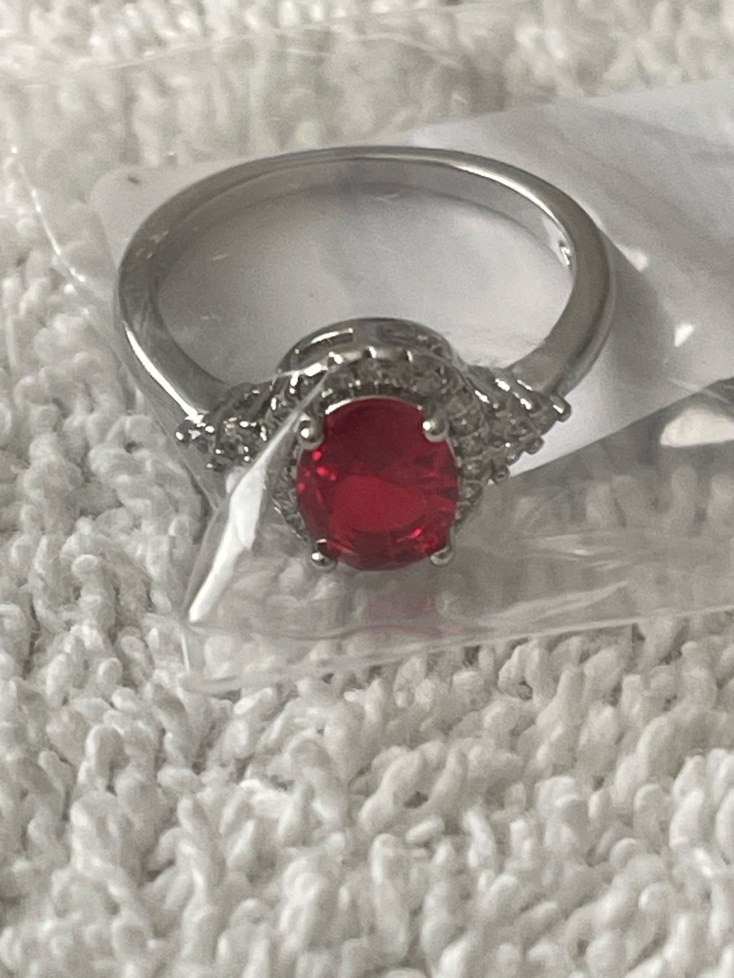 Silver ruby halo ring