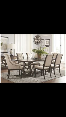 Dining room table with four side chairs and two armchairs