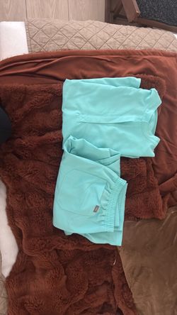 Light blue figs scrubs size medium