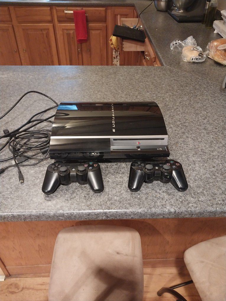 Ps3 Console with 18 Games, 2 Controllers And All Wires