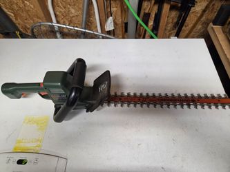 Electric hedge trimmer.