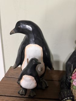wooden penguin figurines.