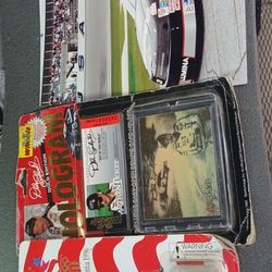 Dale Earnhardt hologram card never been open comes with a authentic photograph of Dale standing next to his car