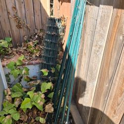 fence stakes(8)  roll of fencing. (approx 25ft) 4ftH 