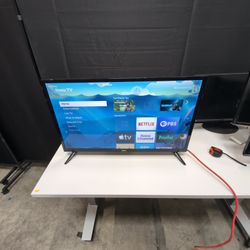 Black Roku Flat Panel TV with Stand