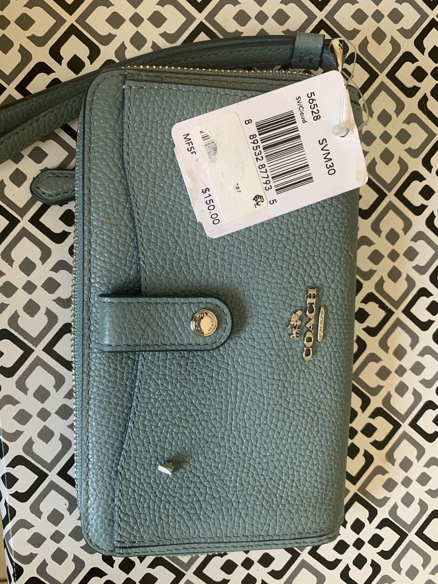 Coach woman’s wallet with tags