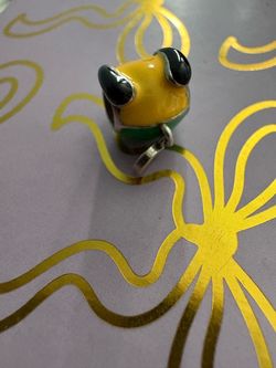 Pluto charm