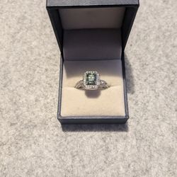 EMERALD CUT GREEN DIAMOND RING