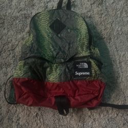 kids north face x supreme bookbag