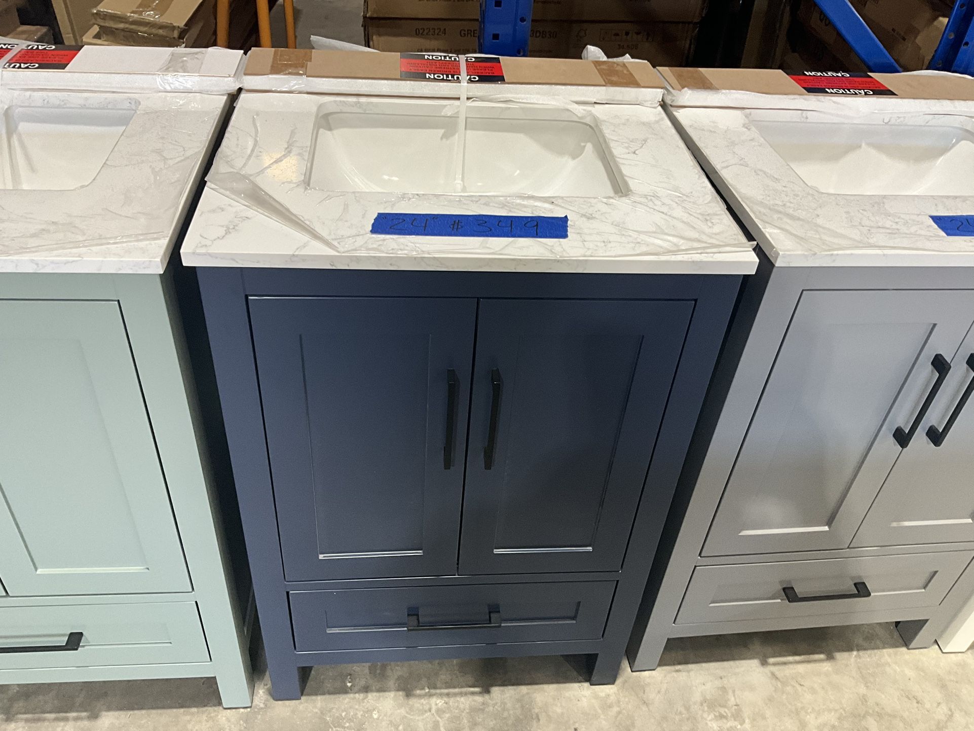 24” Bathroom Vanity in blue , single sink soft close solid wood with vanity top in white $349 Luke’s liquidations warehouse Address: 2434 N Forsyth