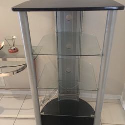 Glass shelves stand (tall 46 inches, wide 24). It’s still available 6/18/25