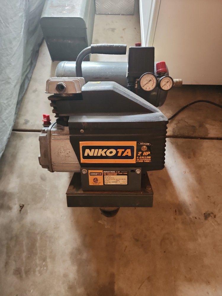 Nikota Air Compressor! Works Perfectly! 2 HP...4 GALLON TWIN TANK!