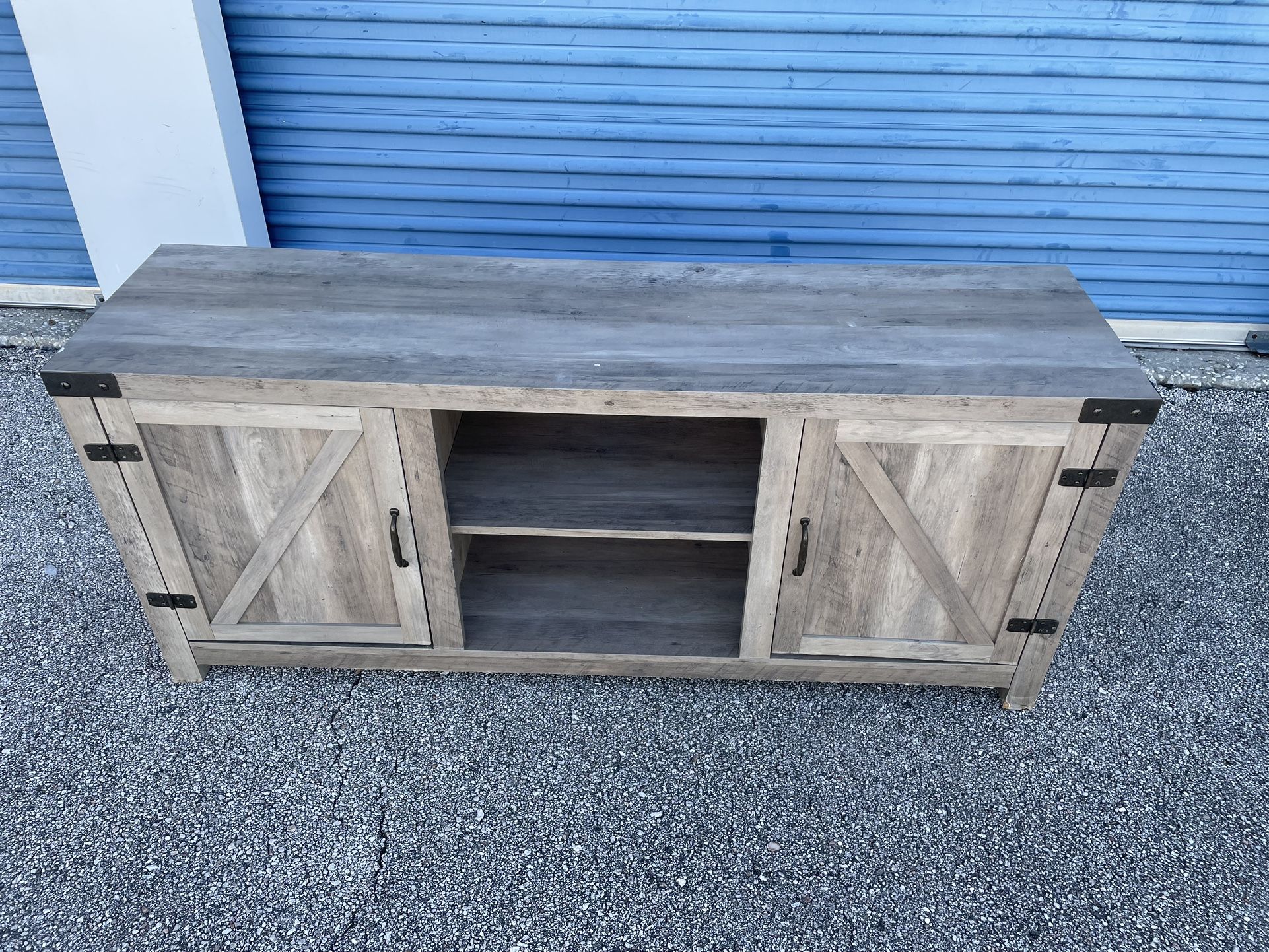 TV Stand -( size: 58.1/2”x 15.1/2”x 25”in high, wood & particle board )- Used