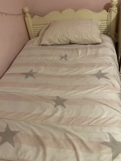 Twin bed with mattress