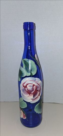 hand painted roses on blue glass wiine bottle flower vase $10 FIRM