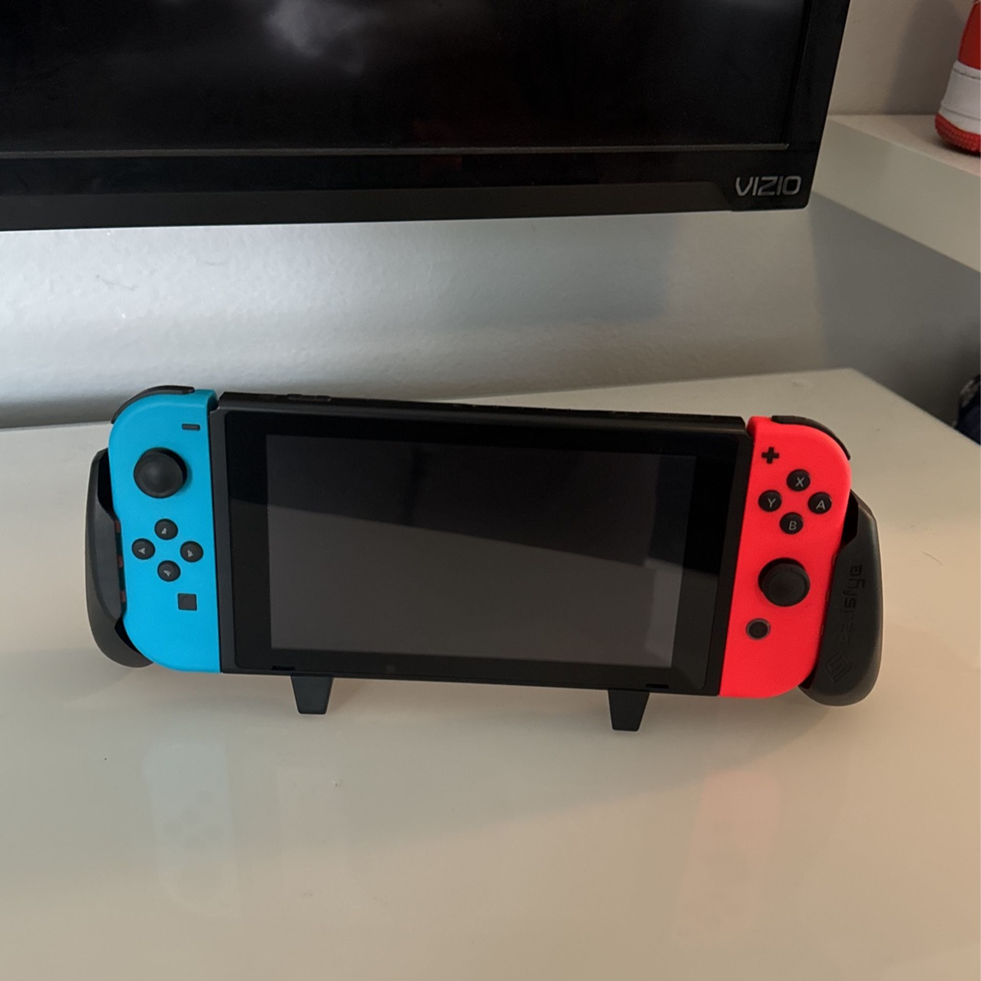 Nintendo Switch With Aftermarket Grip